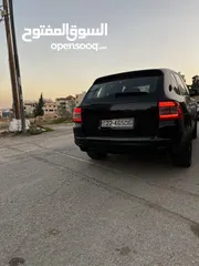  13 بورش كيان 2004 اسود