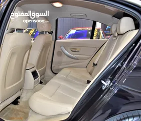 11 BMW 318i ( 2018 Model ) in Black Color GCC Specs