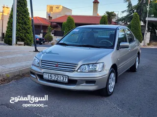  28 مستوبيشي لانسر 2003 محرك 1300جير عادي قتصادية جدا كاسير 4نجوم فحص كامل بسعر 4700