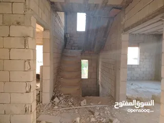  9 منزل عظم المغاريب واجهة حجر ثلاث طوابق