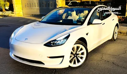  28 تيسلا 2021 model 3 فحص كامل 4 جـيـد فرش ابيض جنط 19بحالة الوكالة لون مميز للبيع بسعر لقطة ومحروووق