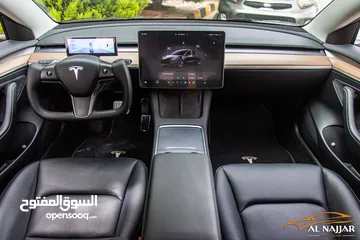  22 Tesla Model 3 2023 Standard plus   السيارة مميزة جدا و قطعت مسافة 7,000 كيلو متر فقط فقط