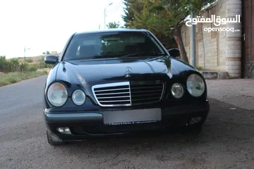  5 E200. 2002  قرش ونص 2002  رقم الهاتف بالوصف