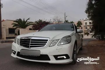  2 Mercedes-Benz E200 AMG kit 2010.