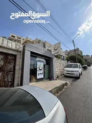  1 دونم ارض للبيع وعليه بناء في رفيديا مقابل جامعة النجاح