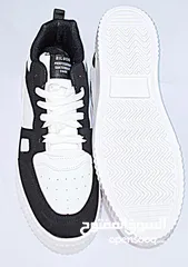  2 Black and white designer shoes  size: 42 negotiable price  FREE DELIVERY
