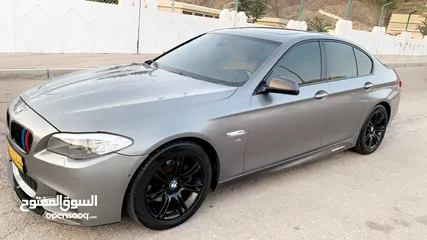  6 BMW 530i 2013 with body kit.