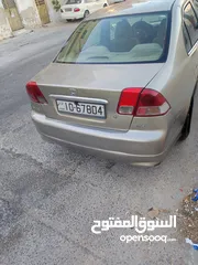  5 هوندا سيفيك لون ذهبي موديل 2003 جير عادي  إقتصادية جدا تقطع بالتنكة 280 كيلو بور ستيرنح سنتر لوك