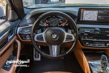  17 Bmw 530I 2023 M kit Gasoline   السيارة مميزة جدا و قطعت مسافة 75,000 كم فقط