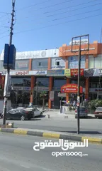  14 محلات تجارية للإيجار بدون خلو عدد أربعة مخازن في موقع مميز في الزرقاء في السوق التجاري دوار حي معصوم