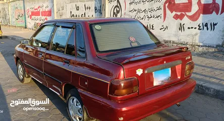  9 كيا برايد سيدان 2004نبيتى اللون