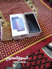  2 تلفون Realme  9T مساحه 128 رام 6 معاها الكرتونه والضمان البطاريه 6000مللي امبير. 18 فلت تدعم الشحن ا