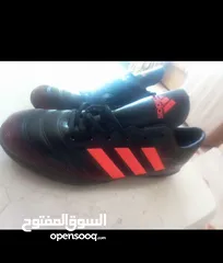  11 Adidas Vietnamese football boots..
