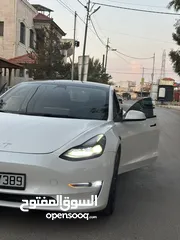  9 تسلا موديل 3 لون أبيض لؤلؤي 2022 Tesla model 3 . 2022