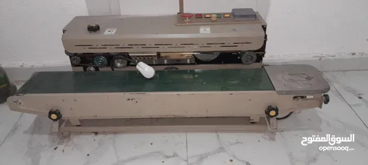  1 ماكينة تلزيق زروف قهوي