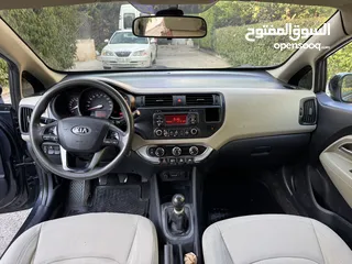  8 كيا ريو 2014 متور 1250 بنزين جير عادي فحص ممتاز  لون كحلي فرش بيج تحكم ستيرنج