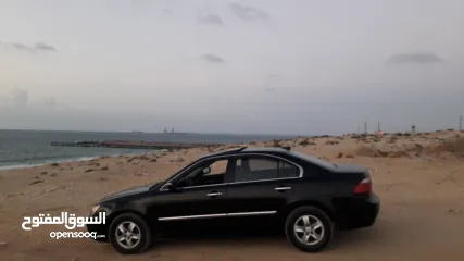  1 سيارة كايا لوتز 2008  لون اسود