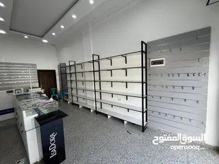  14 ديكور كامل ارفف و ألواح تعليق وبترينات بحالة ممتازة