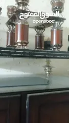  3 طاولات قزاز نفس الصوره وحده كبيره وثنتين صغار