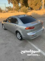  3 ميتسوبيشي لانسر 2012  اصل اسكرا ضفه  لون سكني  تحكم  كشافات زينو  جنط مغنسيوم تعتيم فرش جلد اصلي  مس