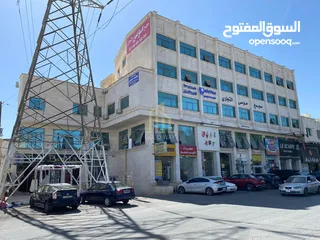  8 في موقع حيوي ومميز في مرج الحمام مجمع تجاري للبيع مكون من خمس طوابق بسعر مغري/ ref 9027
