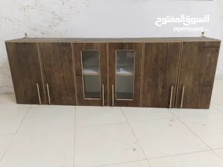  1 خزانة مطبخ خشب 3 ابواب جداريه   نوع mdf مستعمله بحاله ممتازه