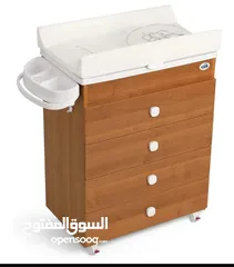  7 تخت طفل وطاولة غيار