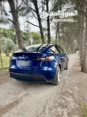  16 ‏Tesla Model ((( Y ))LONG RANGE 2022  Dual Motor  بسعر مغرري فحص كامل فل اضافات