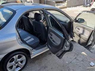 17 كيا سبيكترا 2001 بسعر 2400 جير عادي سياره نظيفه جدا  kia spectra 2001