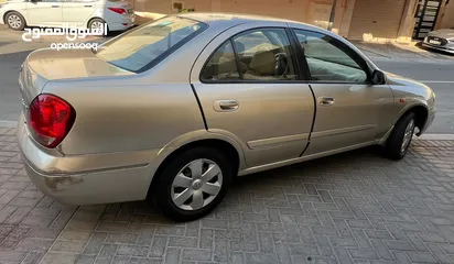  3 Nissan Sunny 2004 Gold color for sale