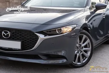  29 Mazda 3 2023 Skyactiv   السيارة وارد و كفالة الشركة و صيانة الشركة و قطعت مسافة 11,000 كم فقط