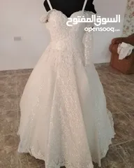  2 فساتين زفاف وسهره وعماني