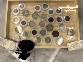  18 عملات ورقيه ومعدنية