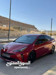  2 تويوتا بريوس برسونا 2021 لون احمر مميز جمرك جديد