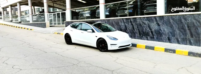  21 تيسلا 2022 model 3 فحص كامل 4 جـــيـــد بدون ملاحظات بودي (كرت ابيض) بحالة الوكالة بسعر لقطة ومحرووق