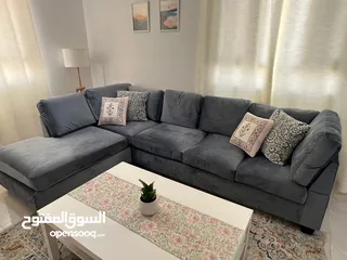  1 L shape sofa , good condition , new cover