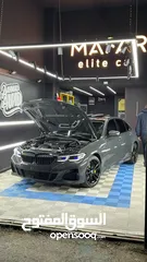  15 BMW 330E M/package - لون باطوني مميز