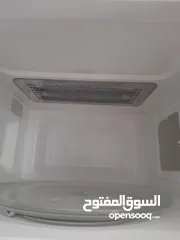  4 خزانة مونة وطاولة شاشة ومايكرويف وخزانة اخدية