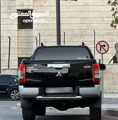  9 ميتسوبيشي L200 2022 لون أسود مميزه فحص كامل كرت ابيض 178 حصان فل الفل ديفلوك
