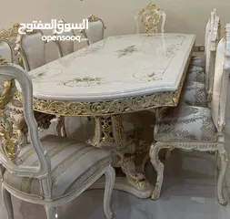  2 السلام عليكم  موجود طاولة سفره مع 8كراسي +دنسوار خشب زان ثقيله نفس الي بالصورة بس الموجودة خشب غير م