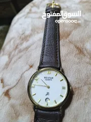  1 ساعه سويسرية اصليه ومطليه ذهب عيار 18