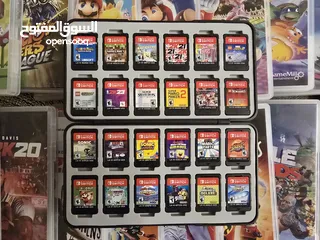  5 Nintendo Switch Bundle with 33 Games (Located Muscat, Madinat Al llam Neighborhood)