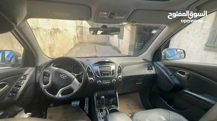  23 2009 ‏Hyundai توسان LX20 اربع ابواب، اللون فيراني، الكراسي جلد والسيارة 92,000 كيلو فقط وبحالة رائعة