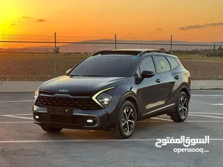  5 كايا سبورتاج  2022 فل الفل فتحة سقف  2x4 ///240Hp بنزين + كهرباء  ( Haybrid) 1600cc
