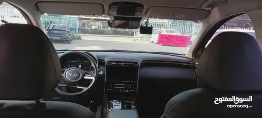  2 Hyundai Tucson hybrid 2021  هيونداي توسان هايبرد 2021  . وارد كوريا الجنوبية  . فحص 7 جيد -