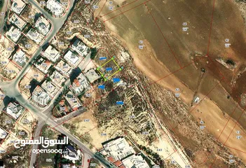  1 ارض غرب عمان البحاث مربعة الشكل على شارع 14 متر