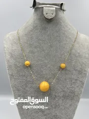  1 قلادة ذهب بكهرمان كلنغرادي نسائية -Women's 18k gold necklace with natural, untreated Clingard amber