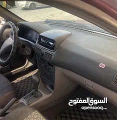  13 تويوتا كوروللا اوتوماتيك اصلي  موديل 2000