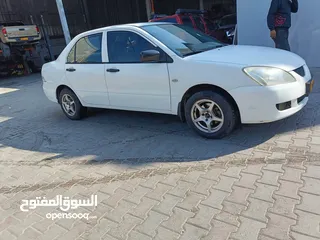  2 Mitsubishi Lancer 2006 White colour