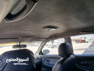  14 كيا سبيكترا 2001 بسعر 2400 جير عادي سياره نظيفه جدا  kia spectra 2001